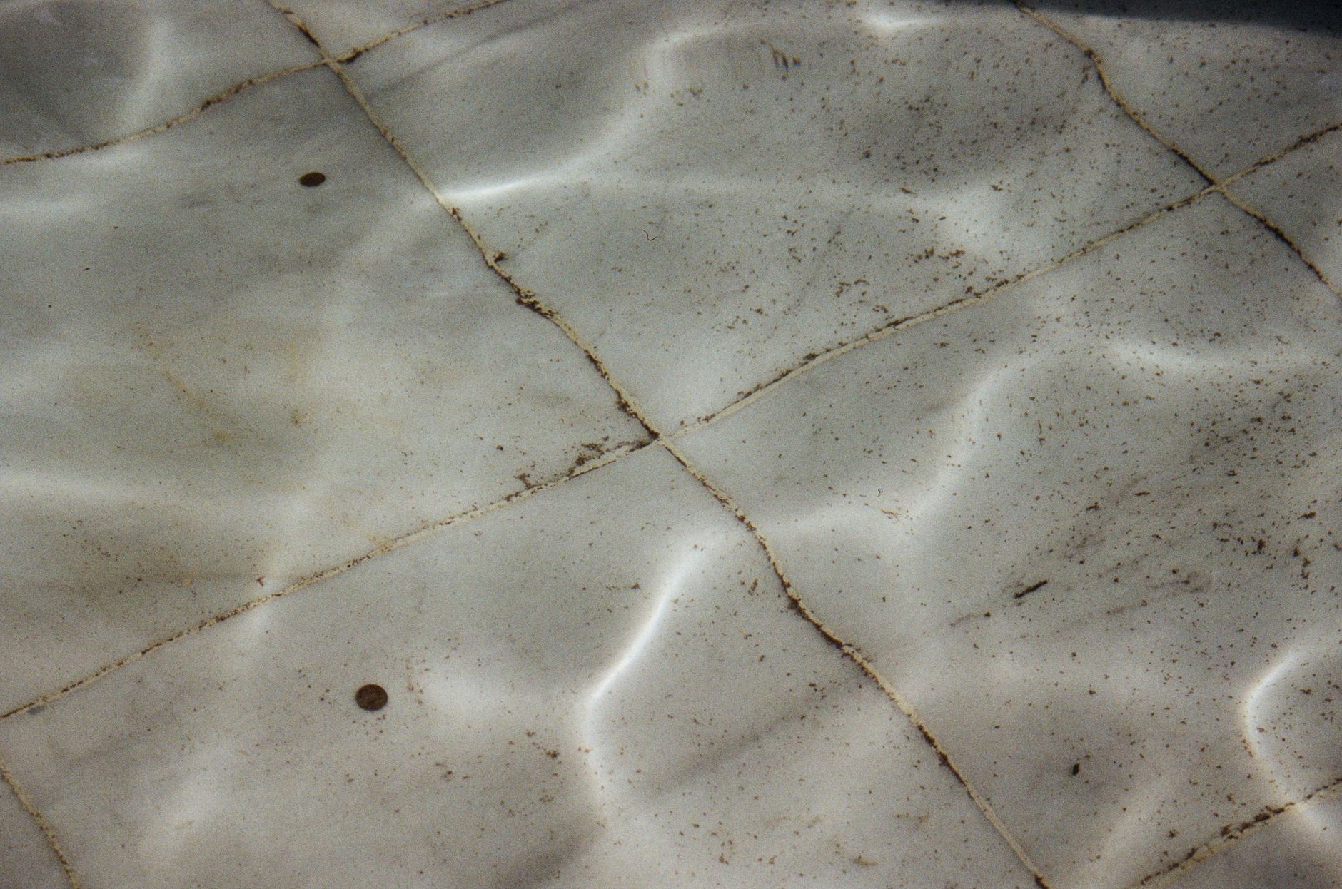 Water rippling on a tiled floor