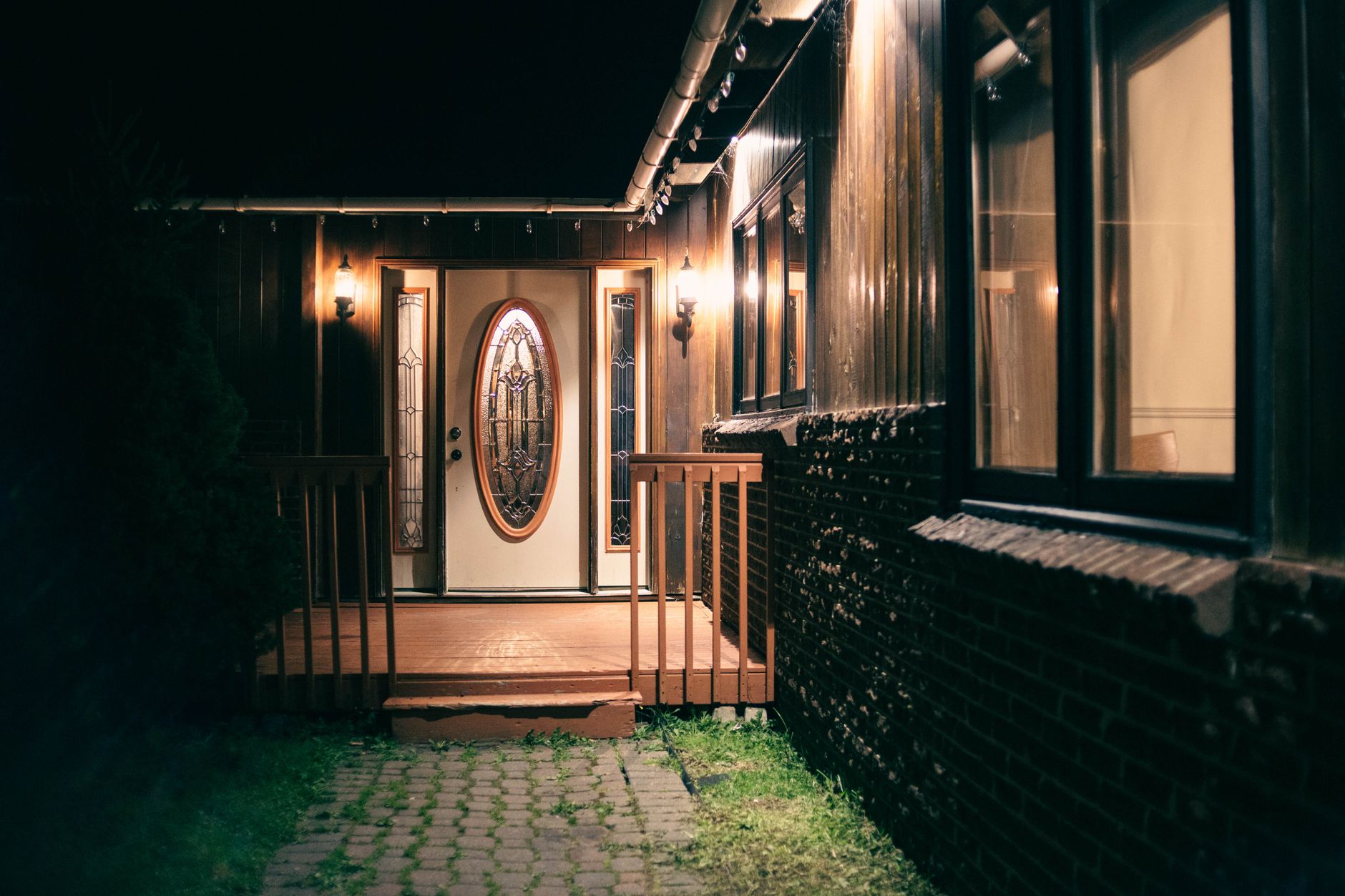 A porch light on at night