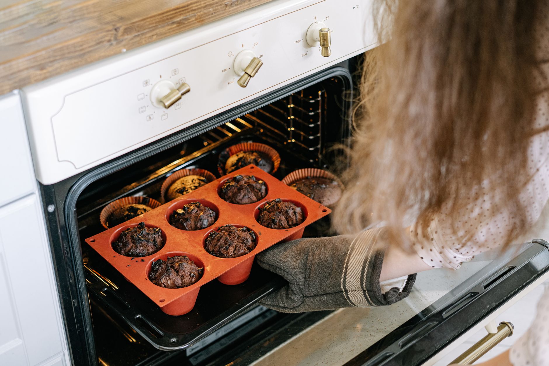 Muffins baking in a home oven