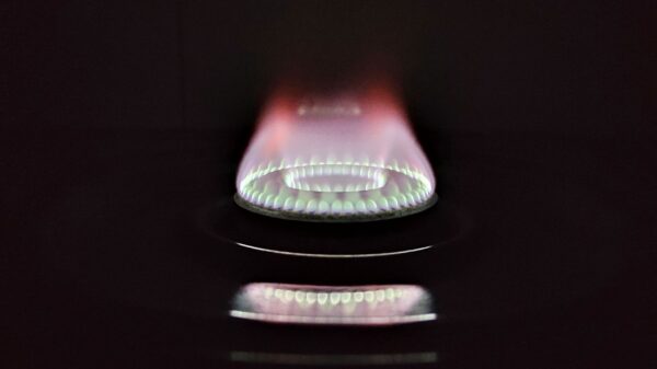 A blue gas flame burning in the dark