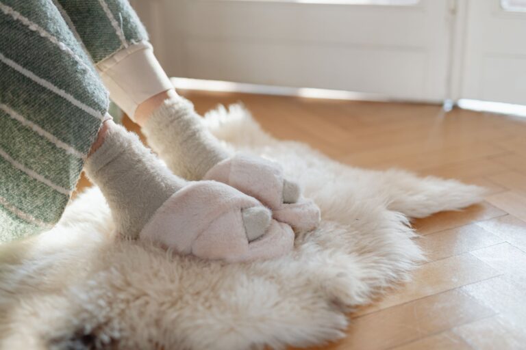 Best non slip slippers: a pair of slippers on a floor at home