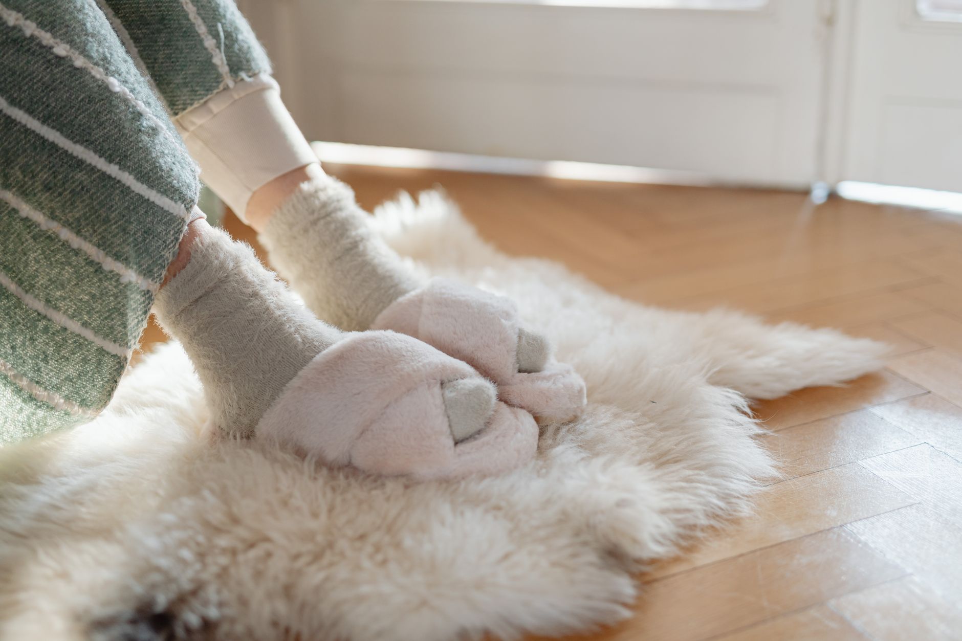 Best non slip slippers: a pair of slippers on a floor at home