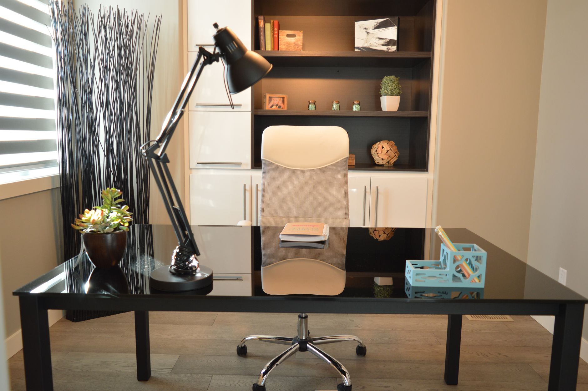 A modern home office with a desk and chair