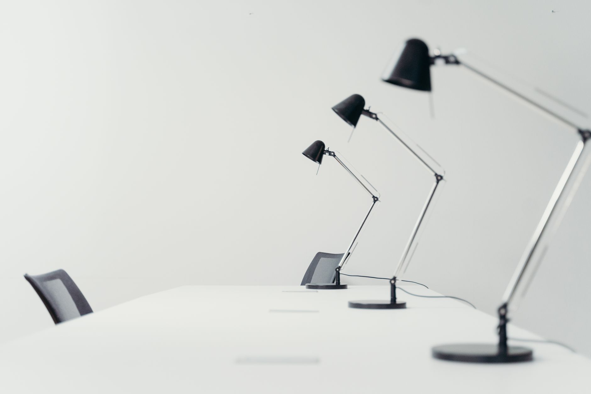 A lamp lighting a home workspace