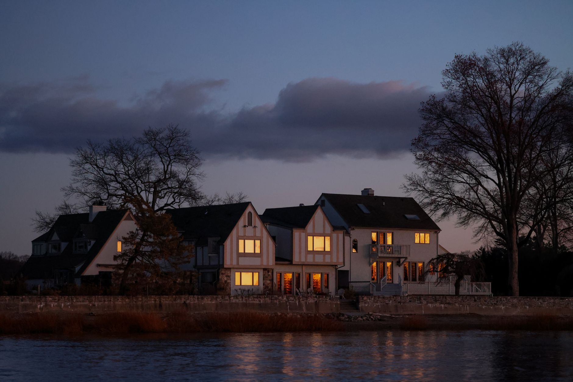 Houses by the water at dusk