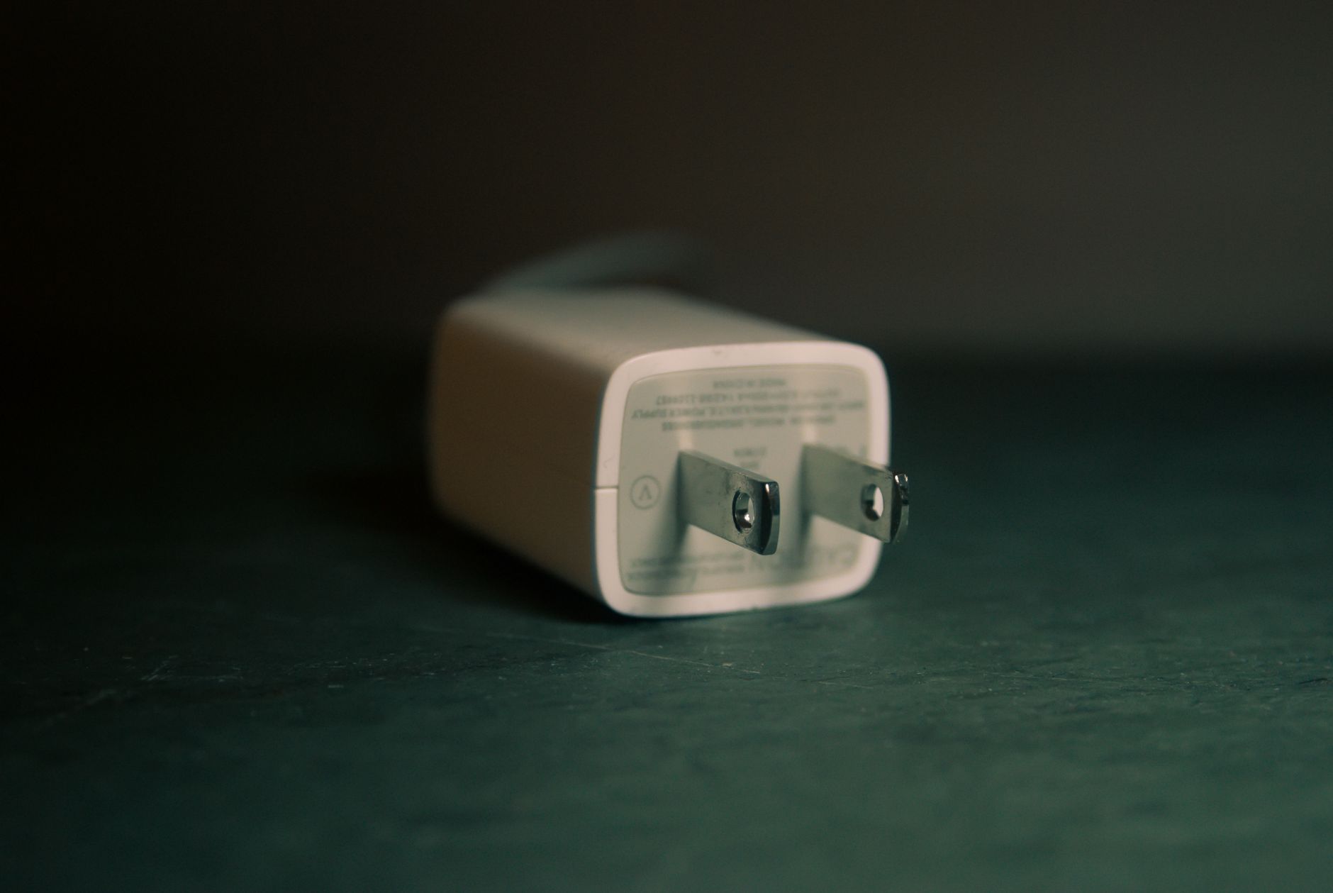A white plug-in power adapter