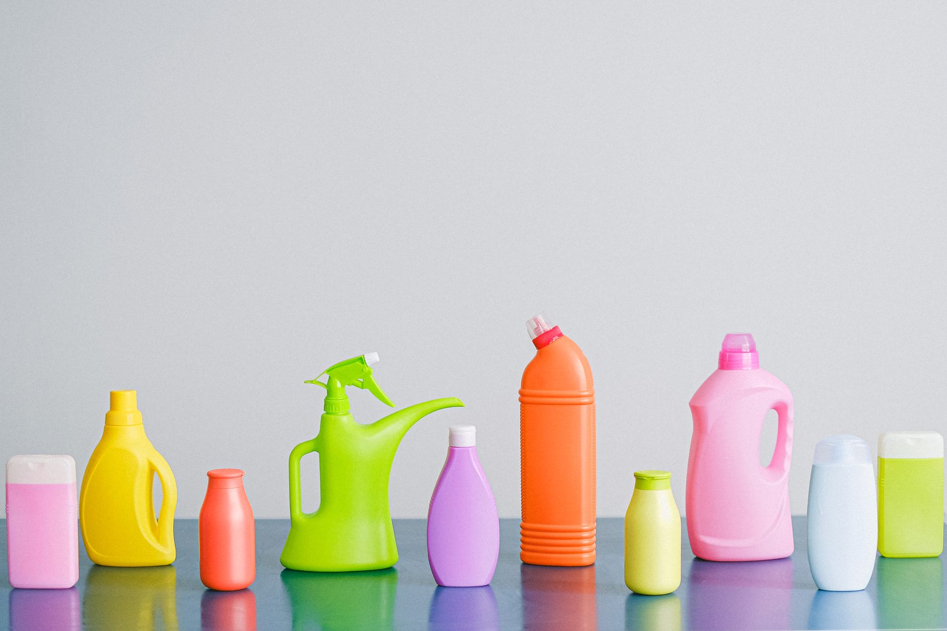 Colorful cleaning bottles on a counter