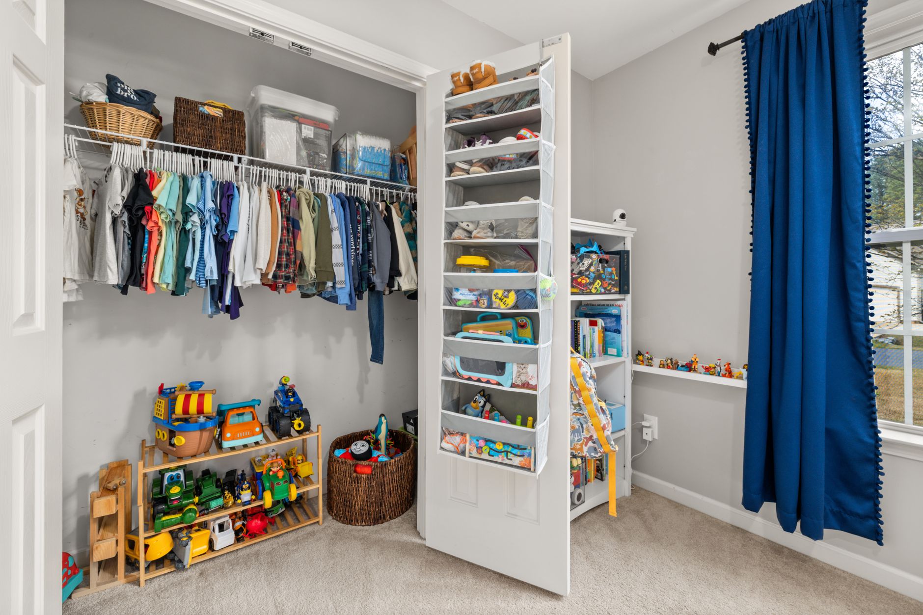 Best over the door organizer: a shelf unit hung on a closet door
