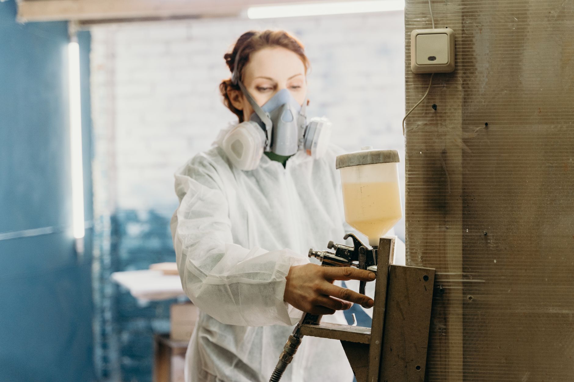 Best paint sprayer: a spray gun applying paint