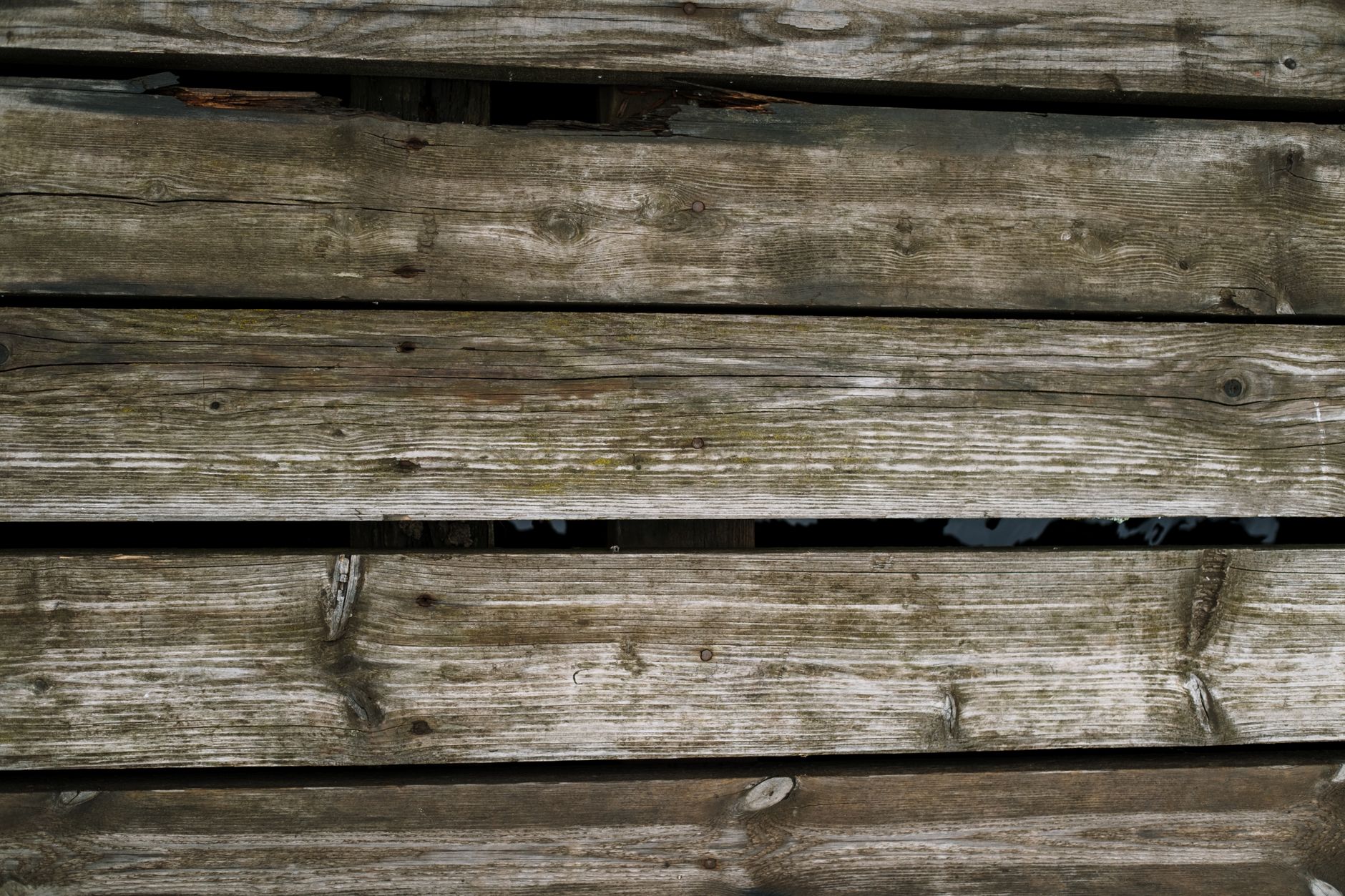 A wooden deck with a fresh coat of stain