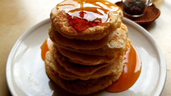 Best pancake griddle: syrup poured over a stack of pancakes