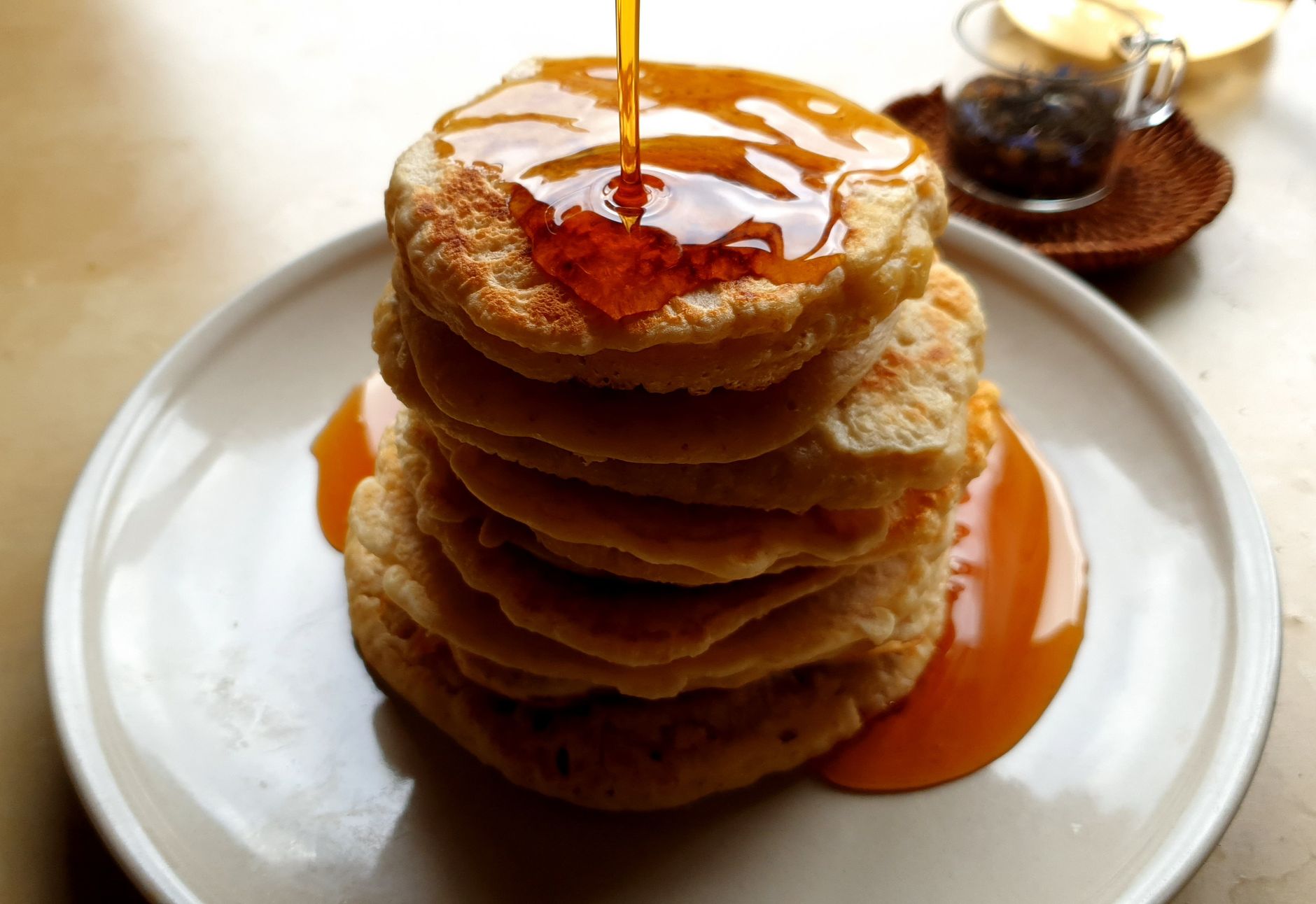 Best pancake griddle: syrup poured over a stack of pancakes