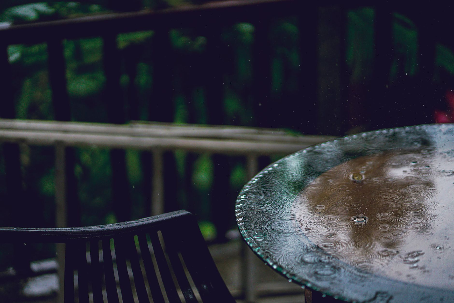 Rain falling on an outdoor patio
