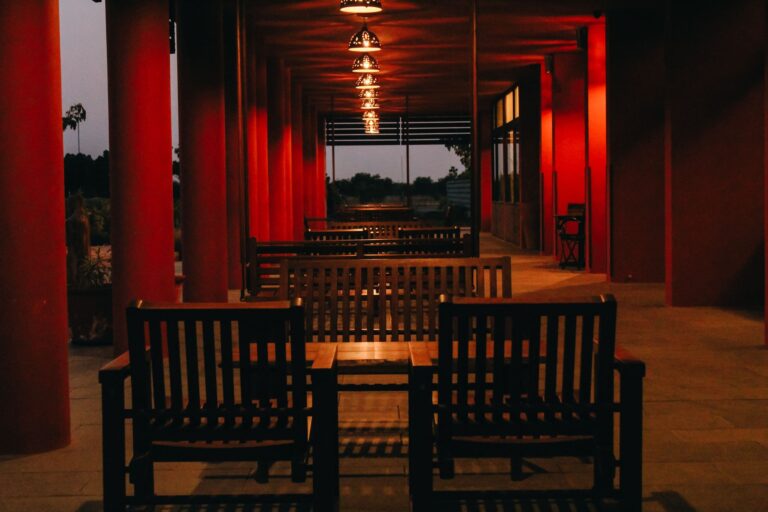 Best patio heater: tables and chairs on a covered terrace at dusk