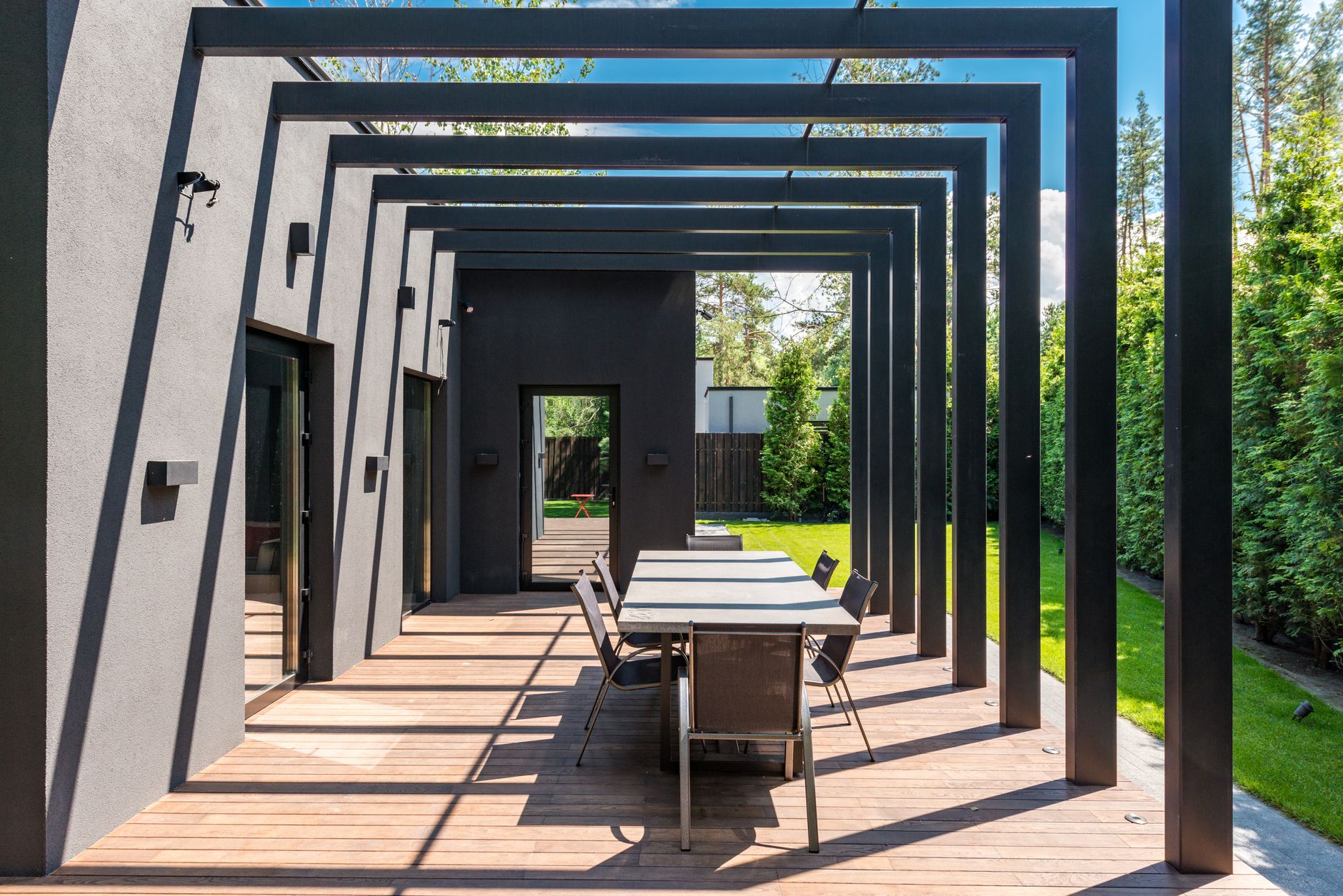 An outdoor dining table set up in a backyard
