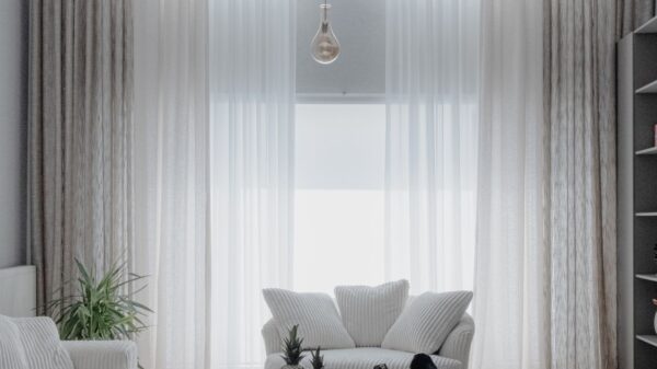 A bright living room with sheer curtains