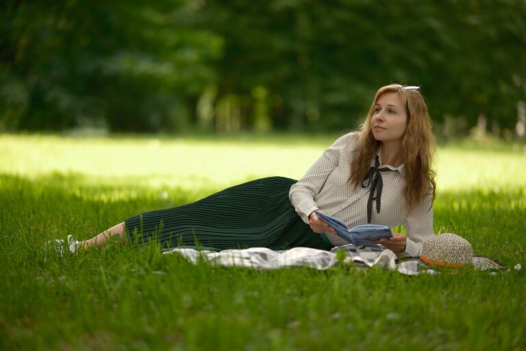 Best picnic blanket: a blanket spread out on the grass in a park