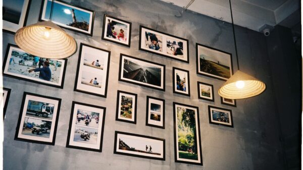 Best picture frames: framed photos arranged on a living room wall