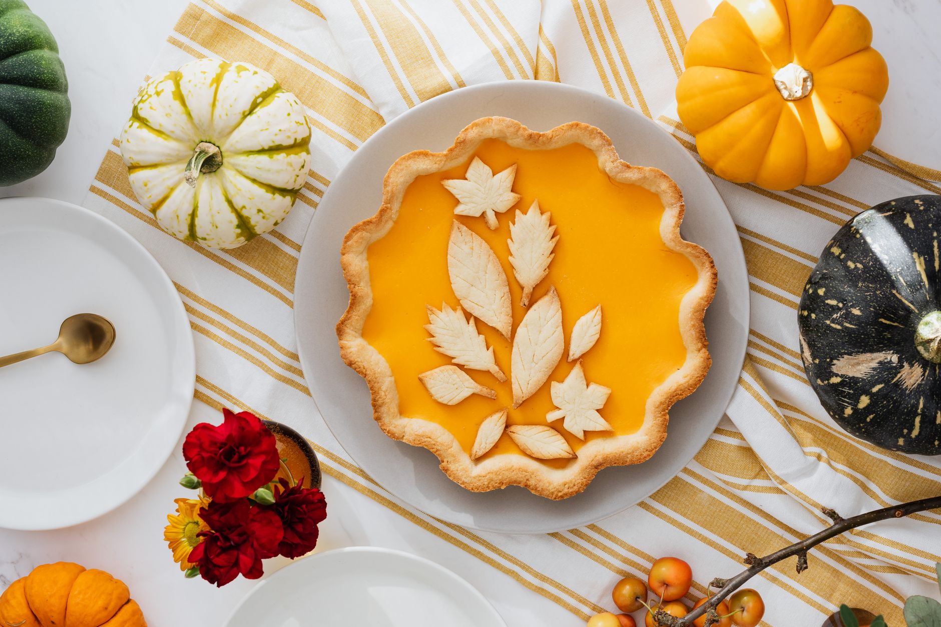 A pumpkin pie on a table