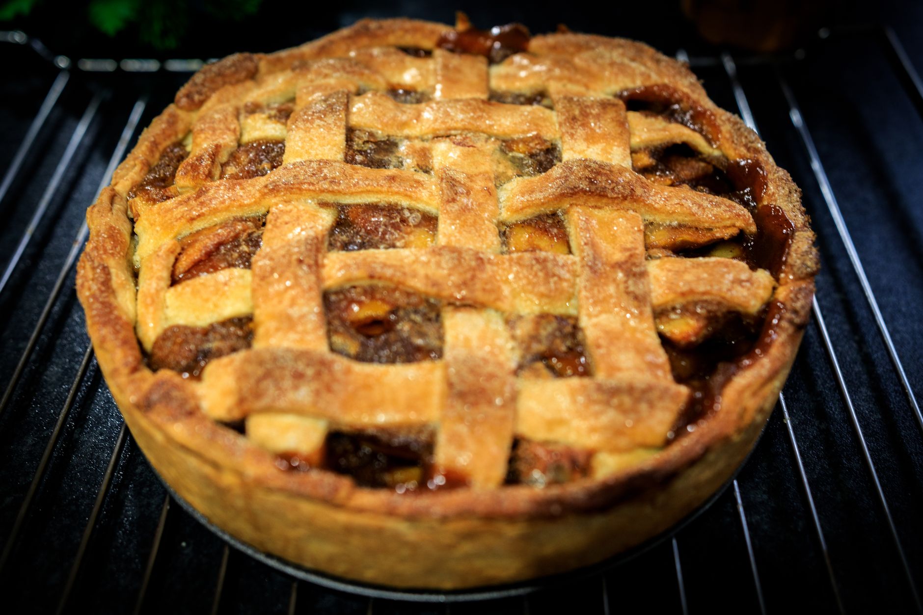 A pie baking in an oven