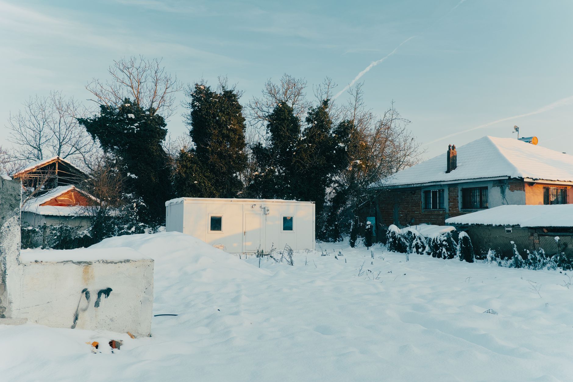 Houses in deep snow