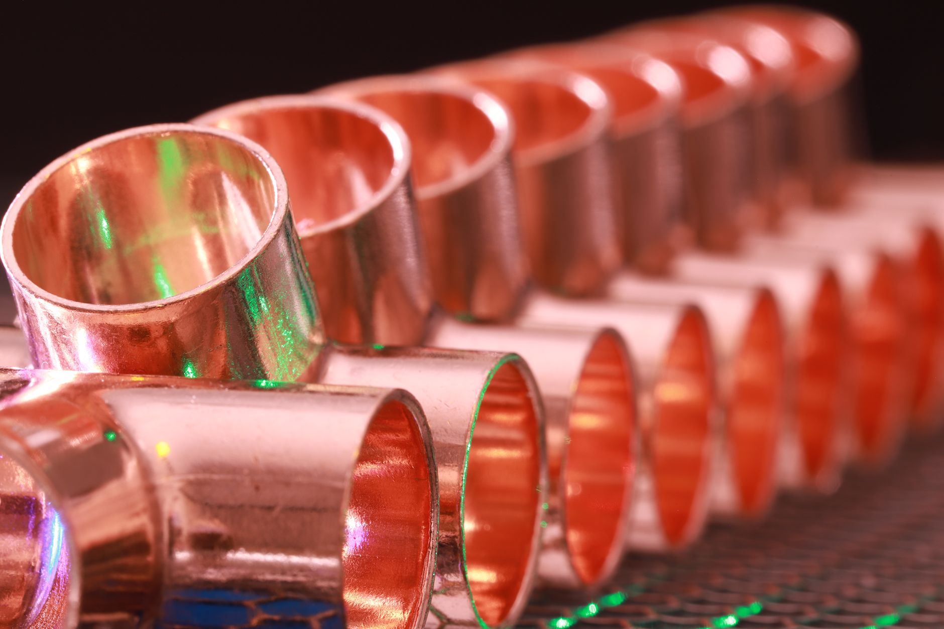 Rows of copper pipe fittings