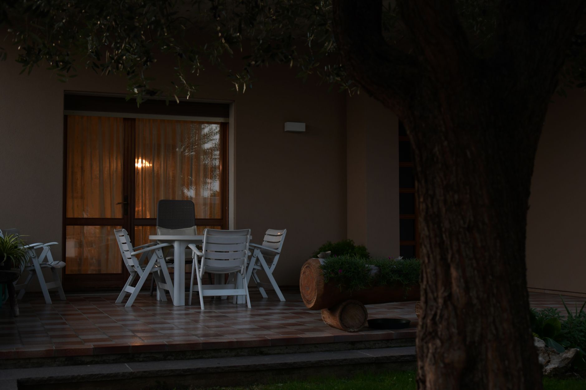 A backyard patio in the evening
