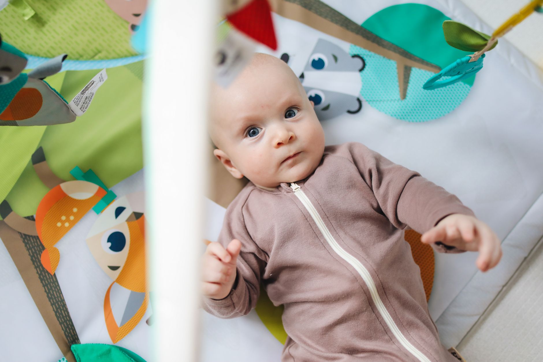 Best play mat: a soft play mat set up on a living room floor