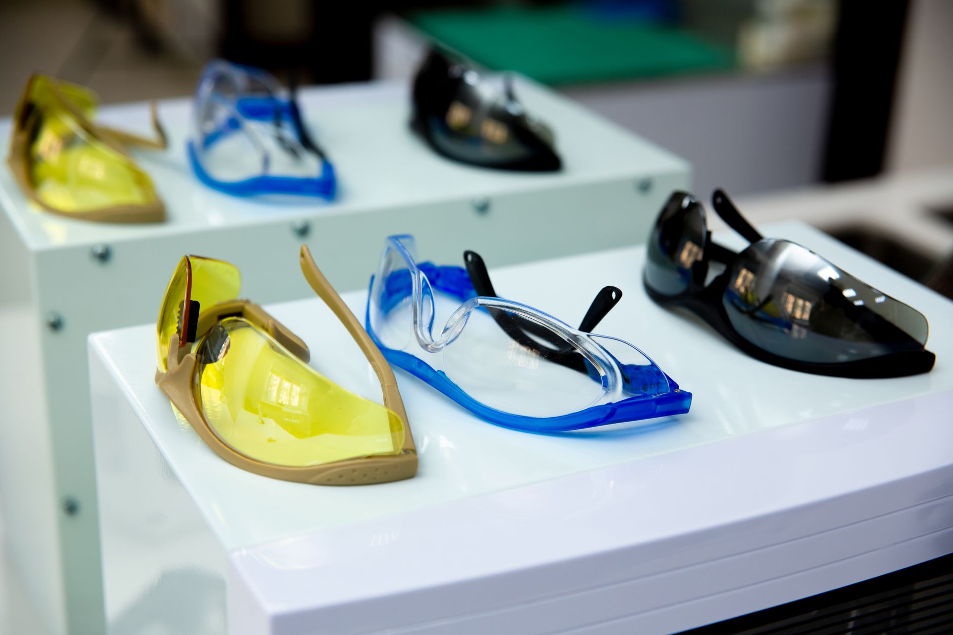 Safety glasses resting near tools