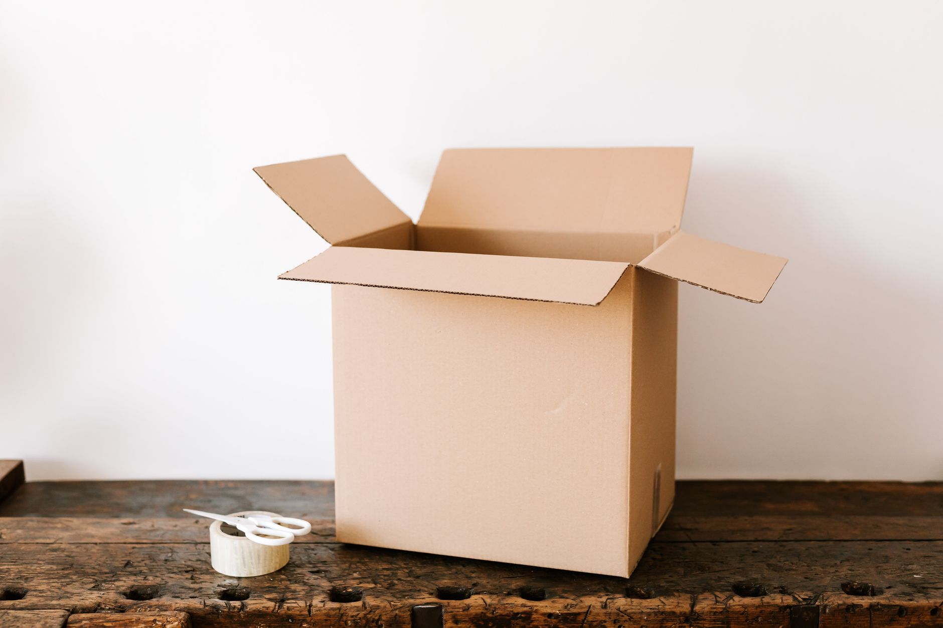 Opening a cardboard box at home