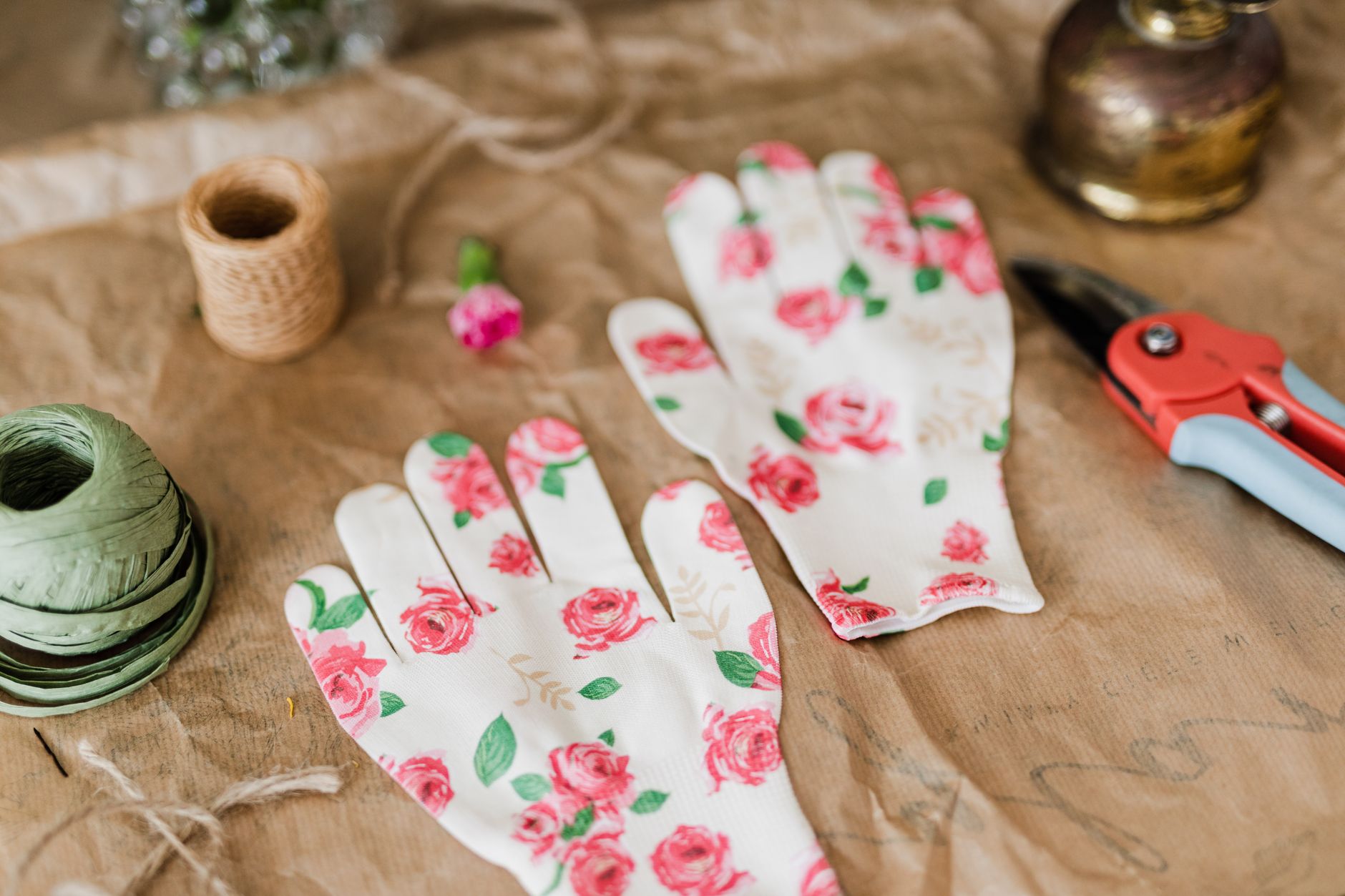 Garden tools and twine on a potting bench