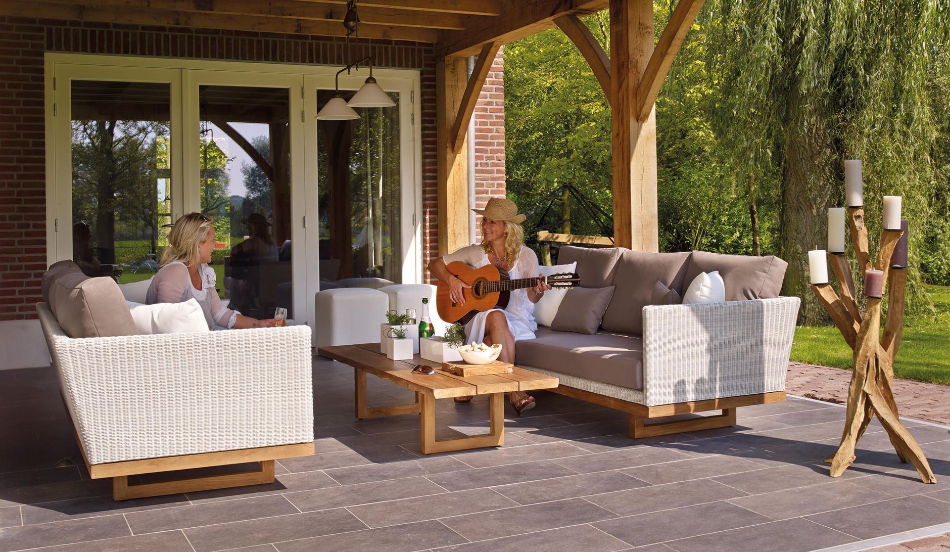 Friends relaxing on a covered patio