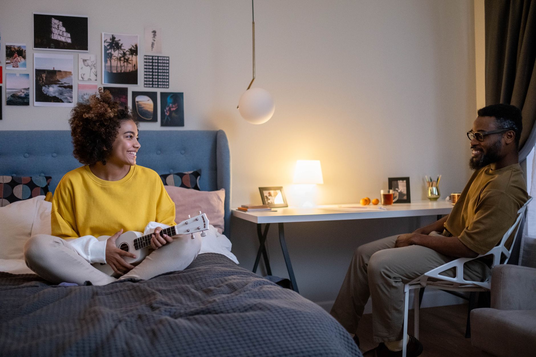 A couple relaxing in a bedroom