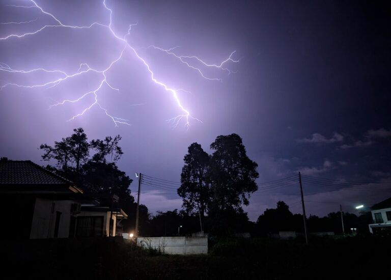 Best portable power station: a home at night during a power outage