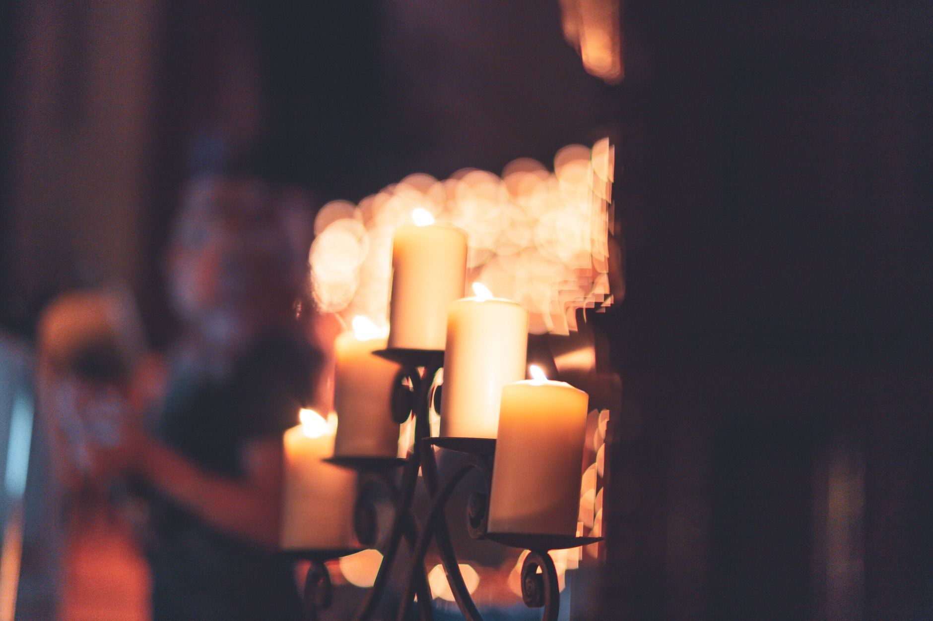 Candles lit in a dark room during a power outage