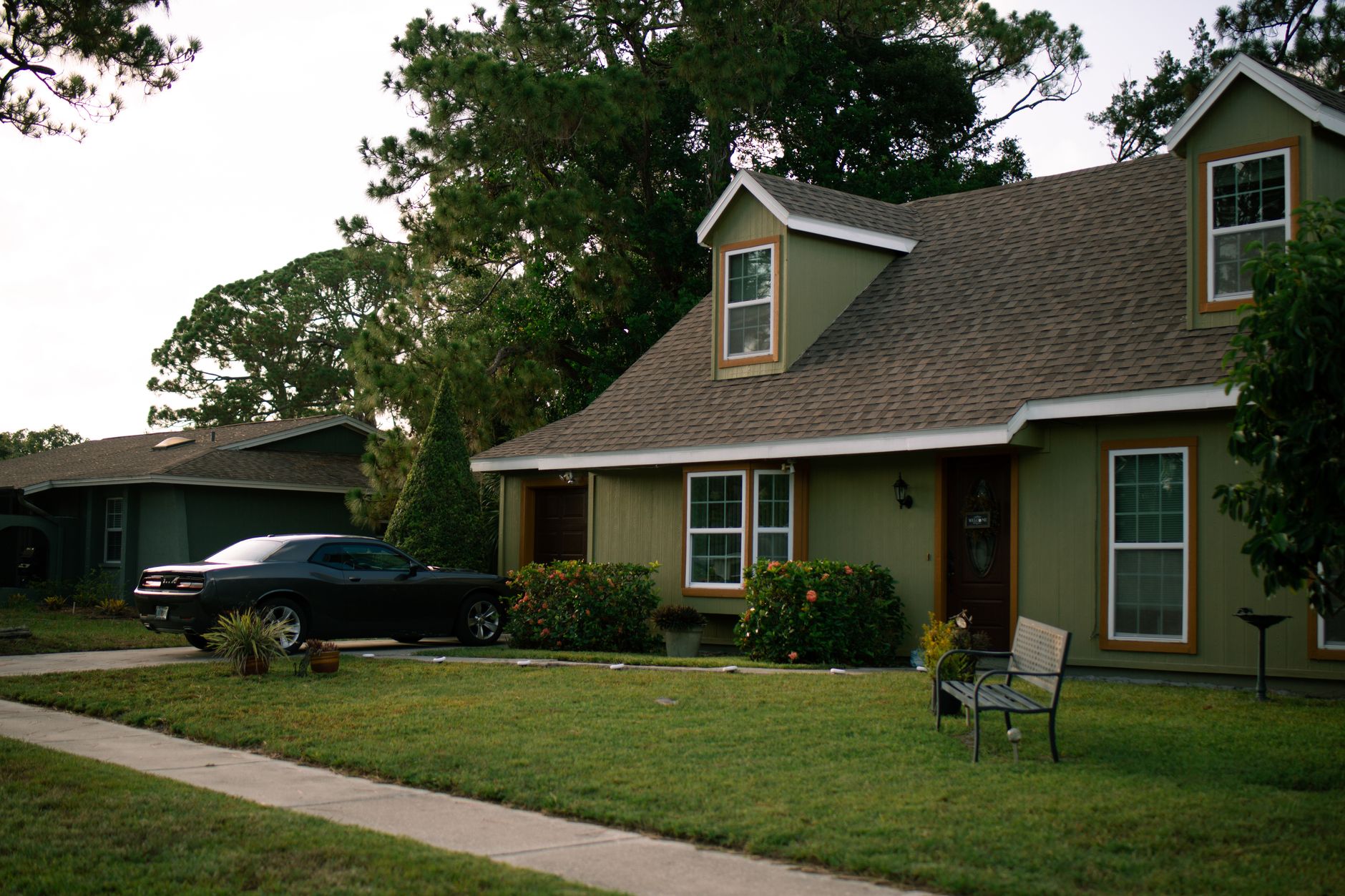 A house with a front lawn and walkway