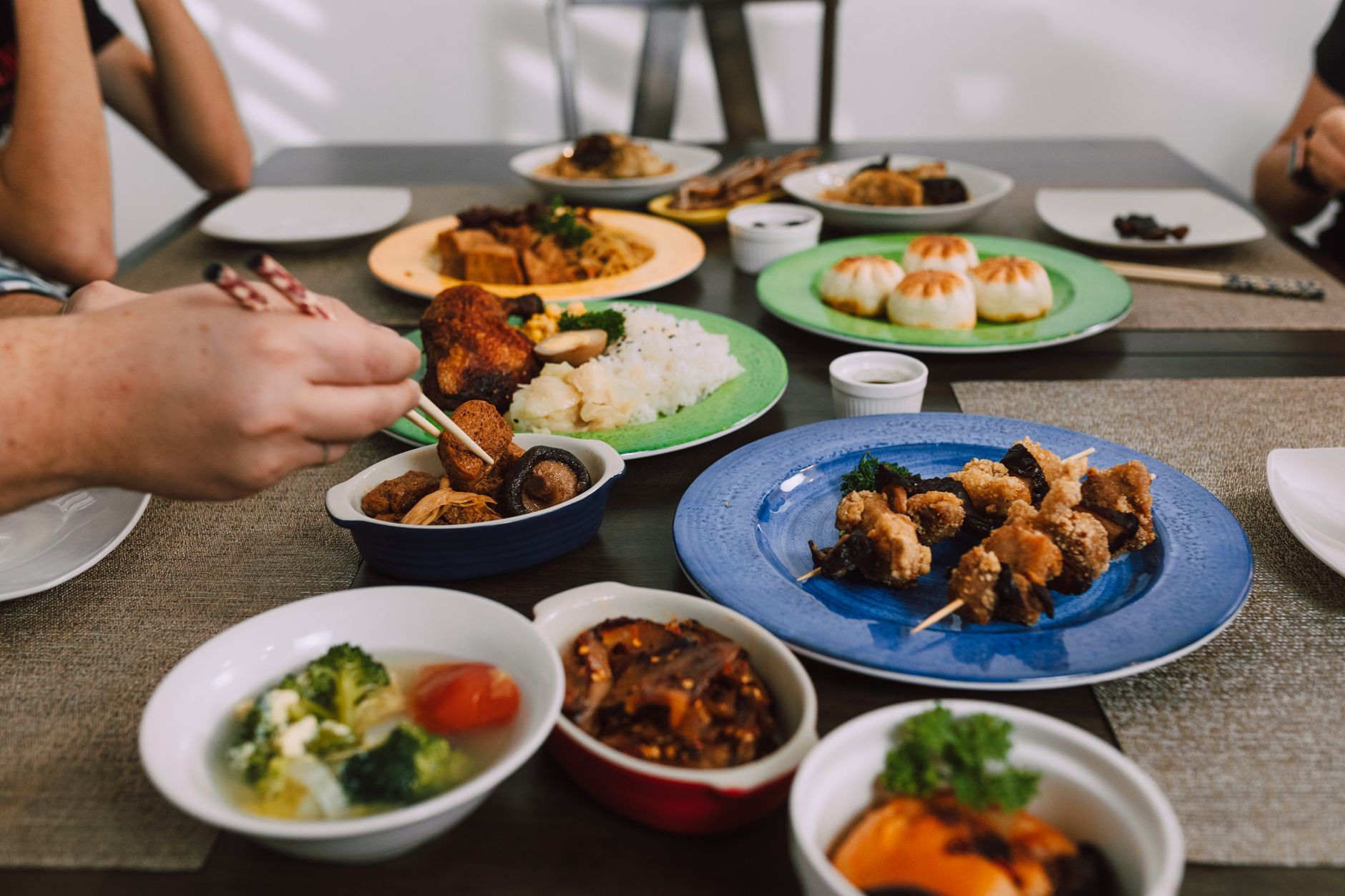 A shared meal with rice and side dishes