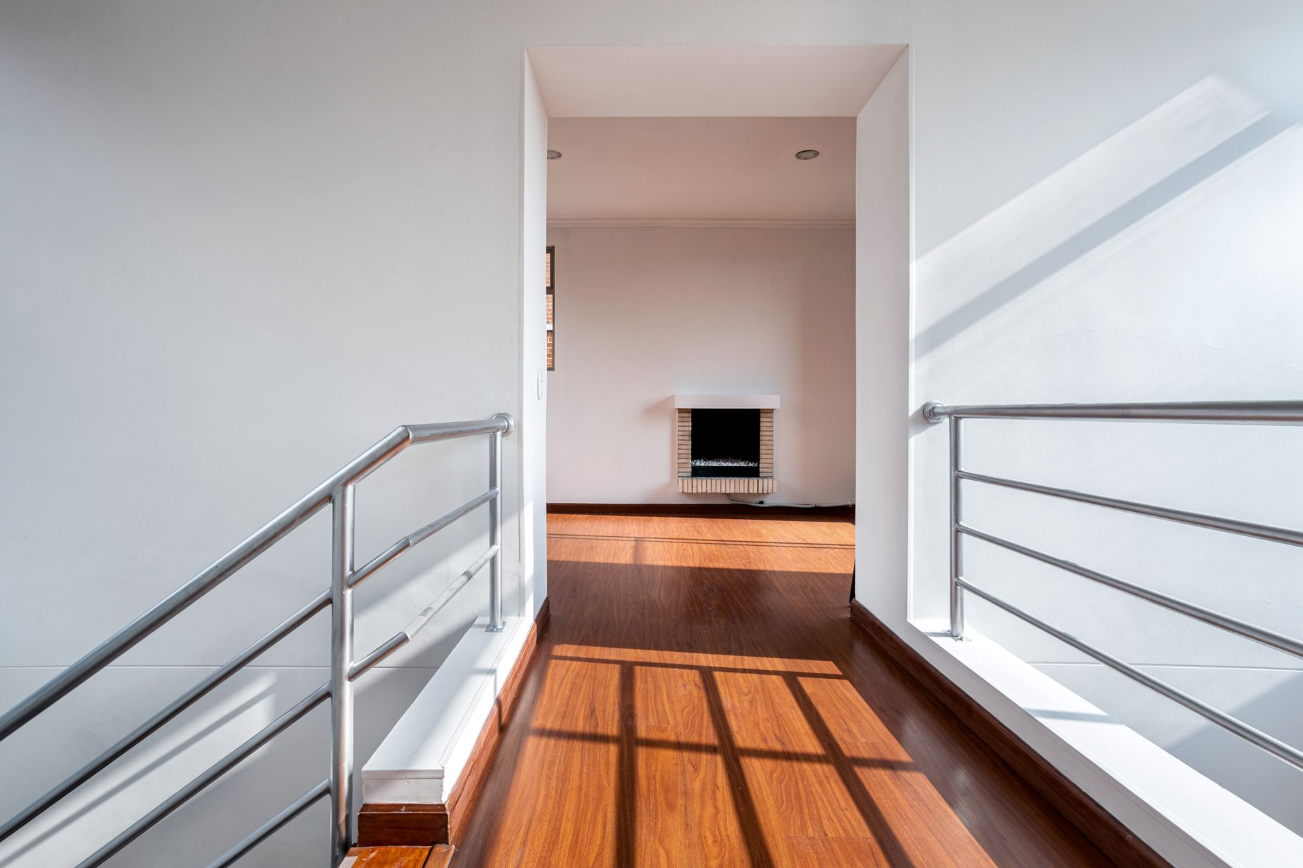 A bright, uncluttered hallway in a home