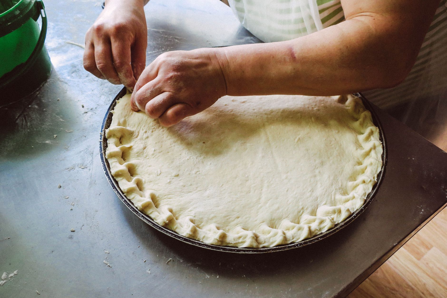 A homemade pie crust ready for the oven