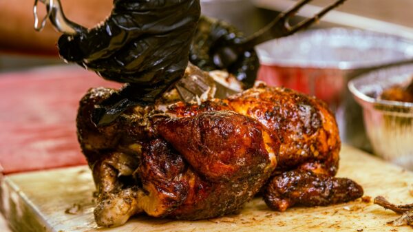 Best rotisserie oven: a roast chicken being carved