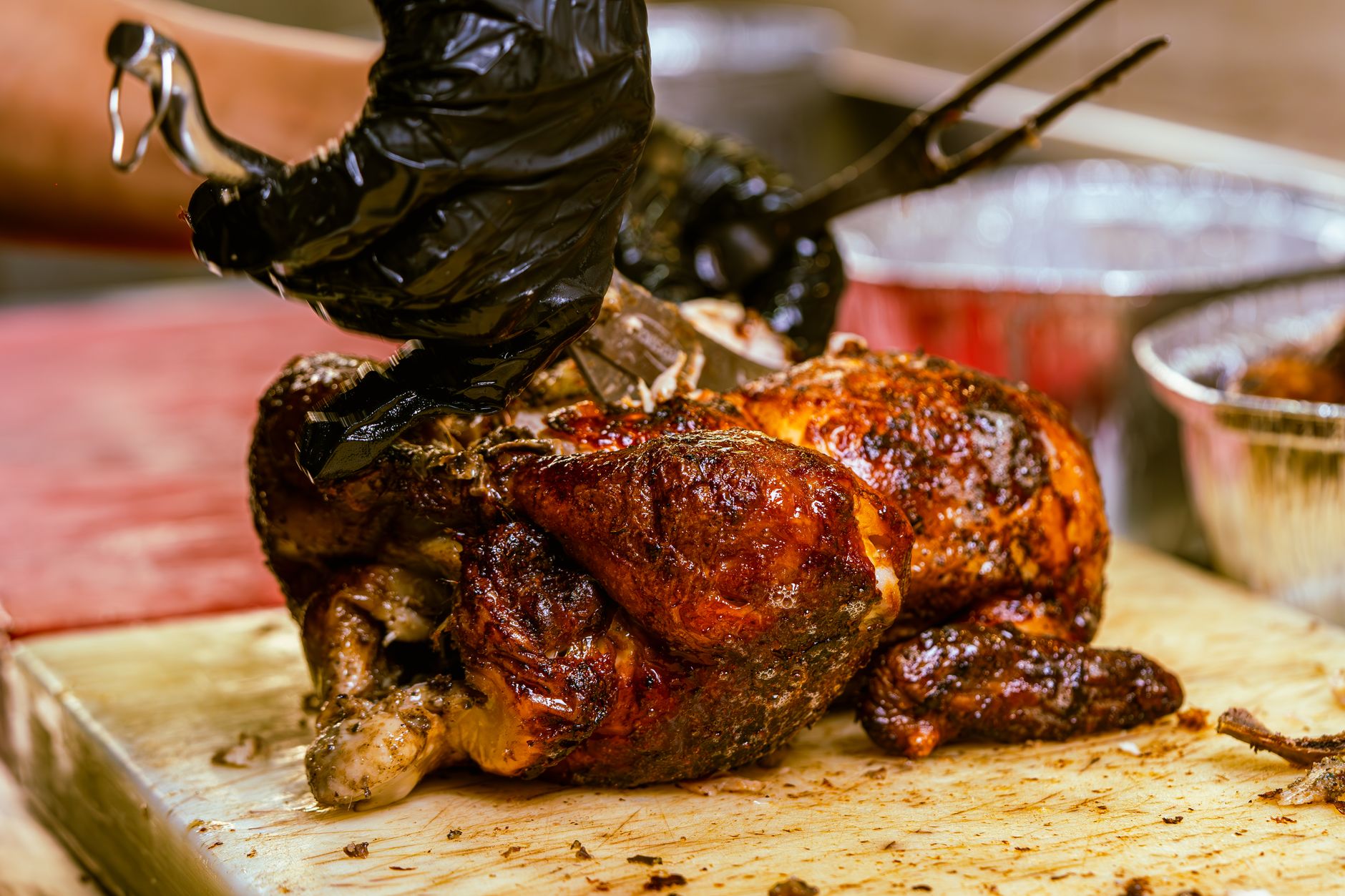 Best rotisserie oven: a roast chicken being carved