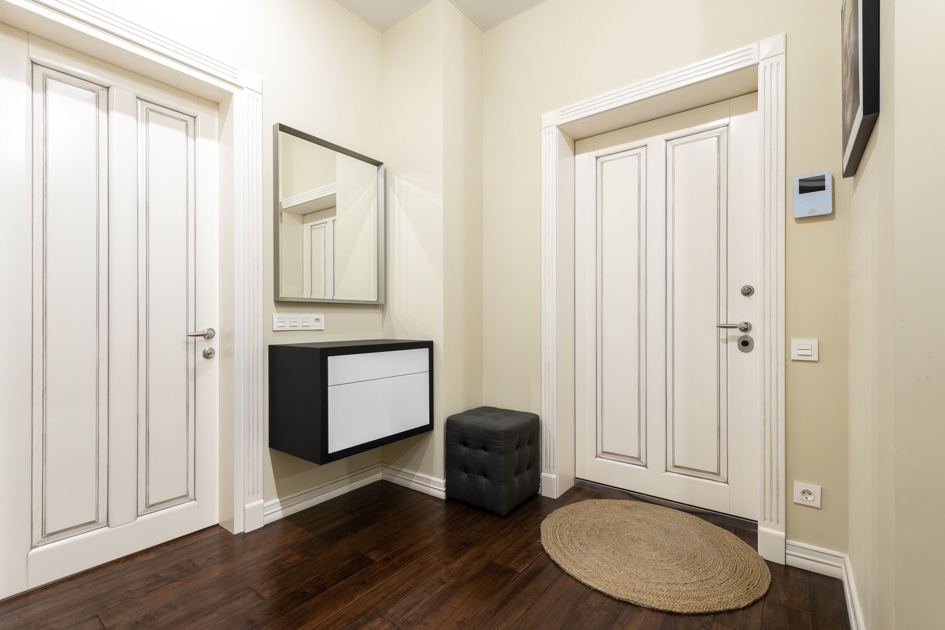 A long runner rug in a home hallway
