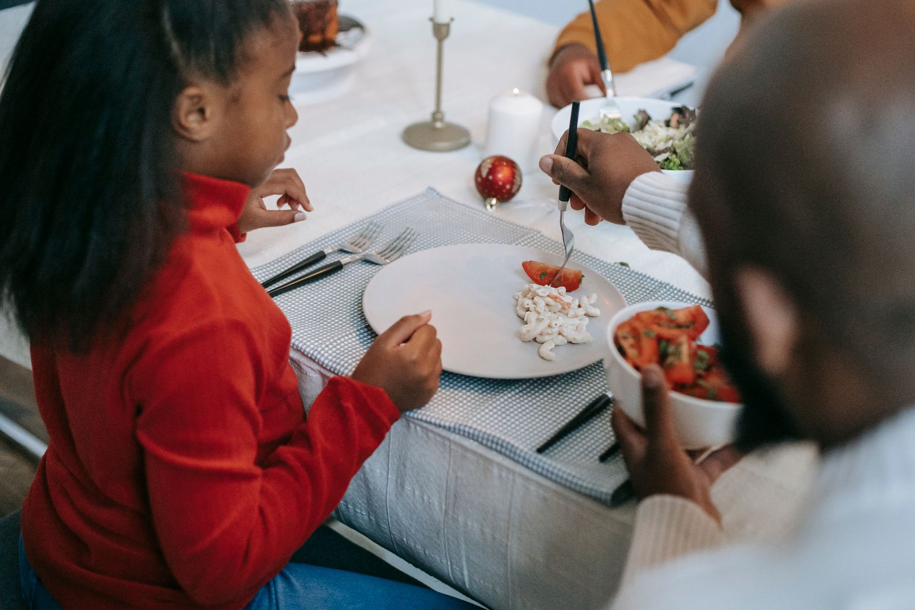 A family sharing a meal at the table