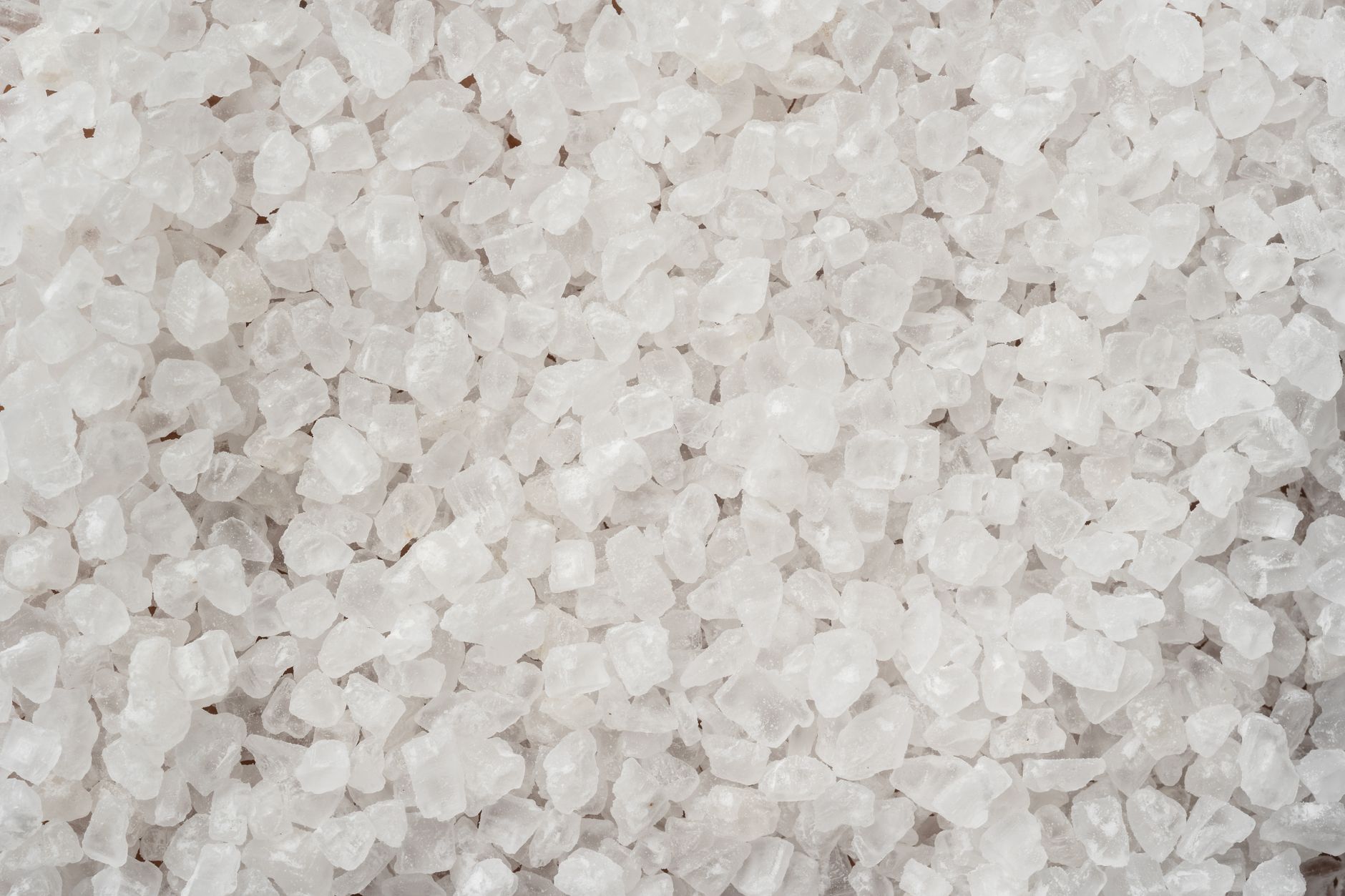 Coarse salt crystals in a small bowl