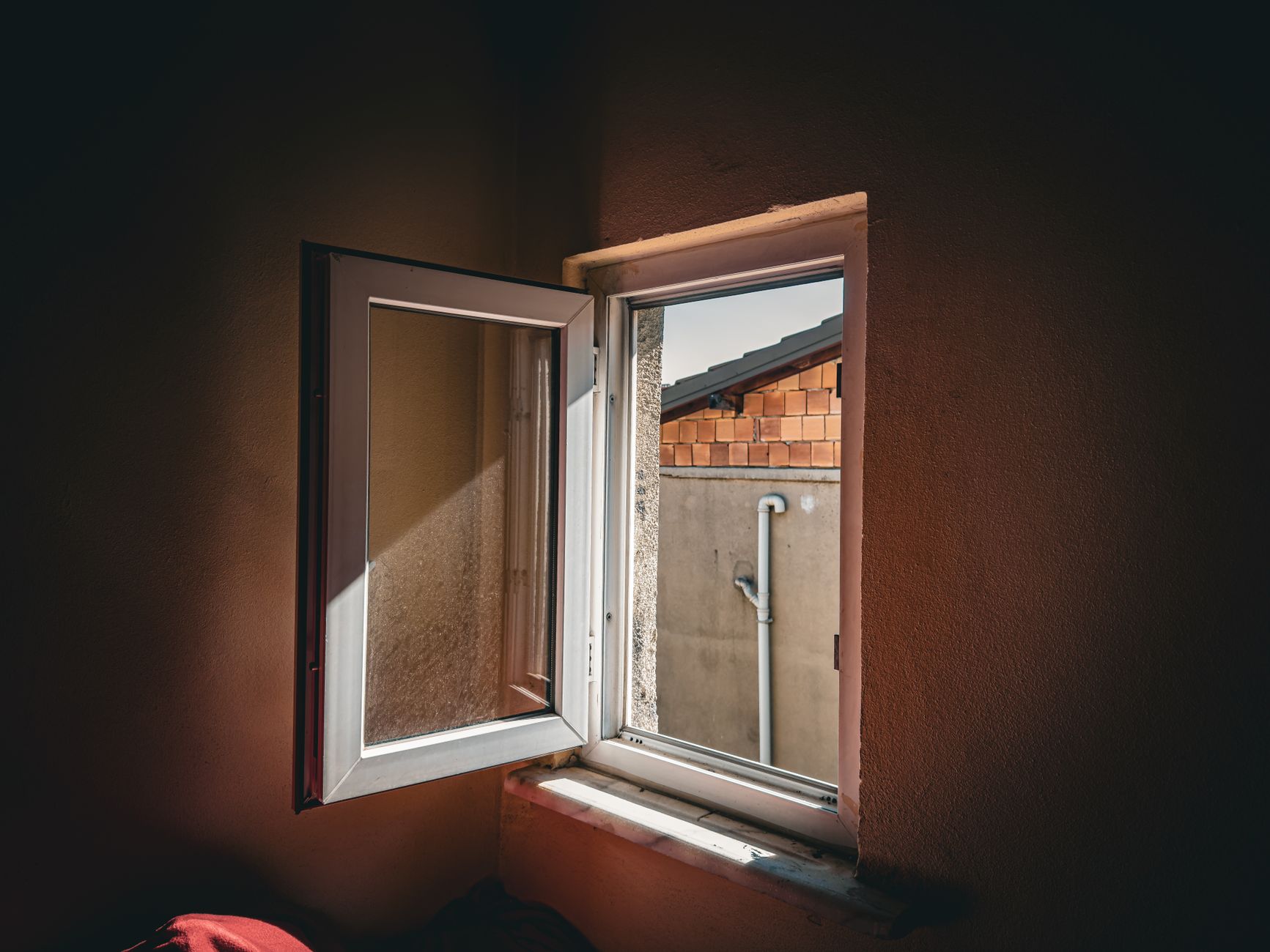 An open window on a warm day