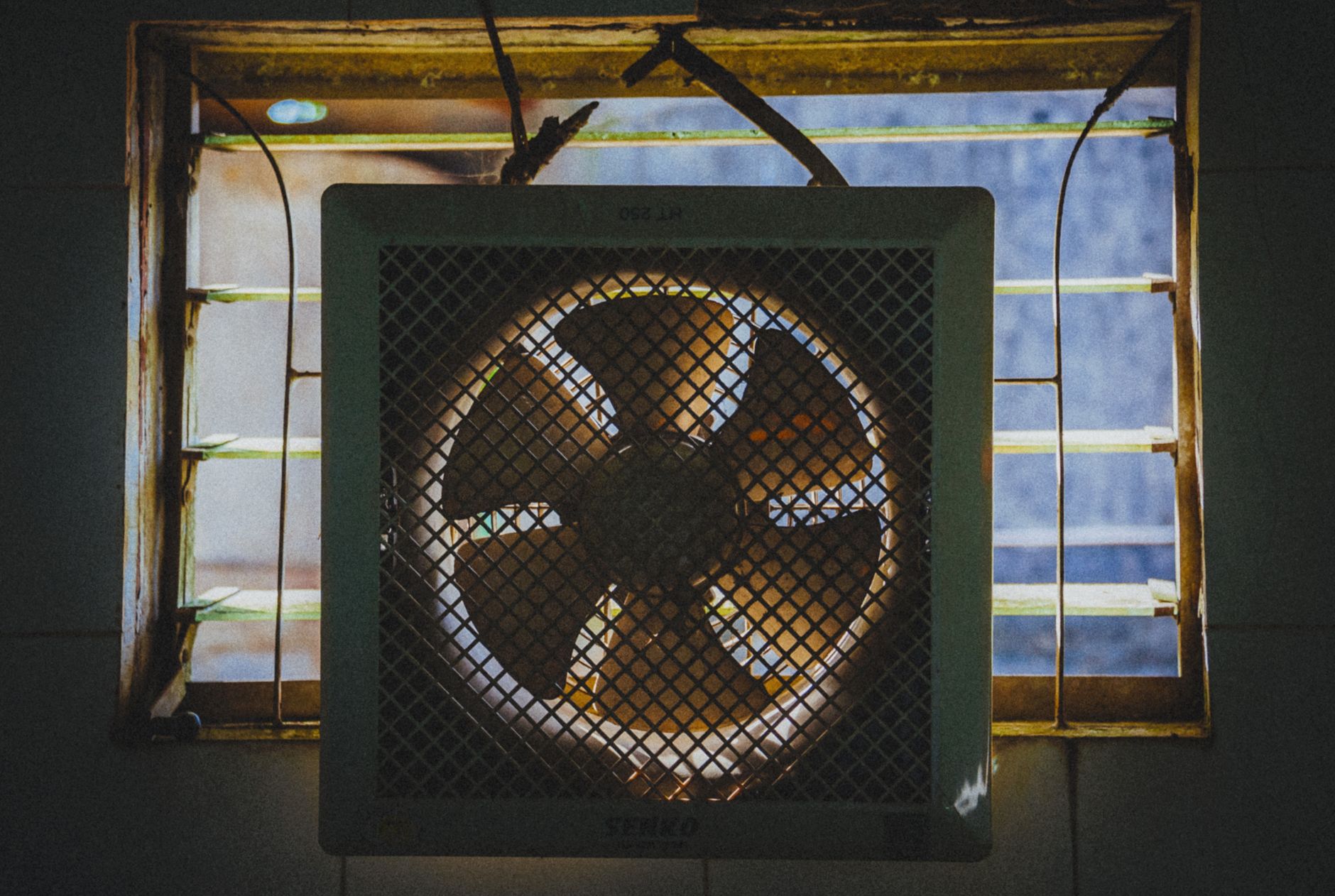 An exhaust fan in a window