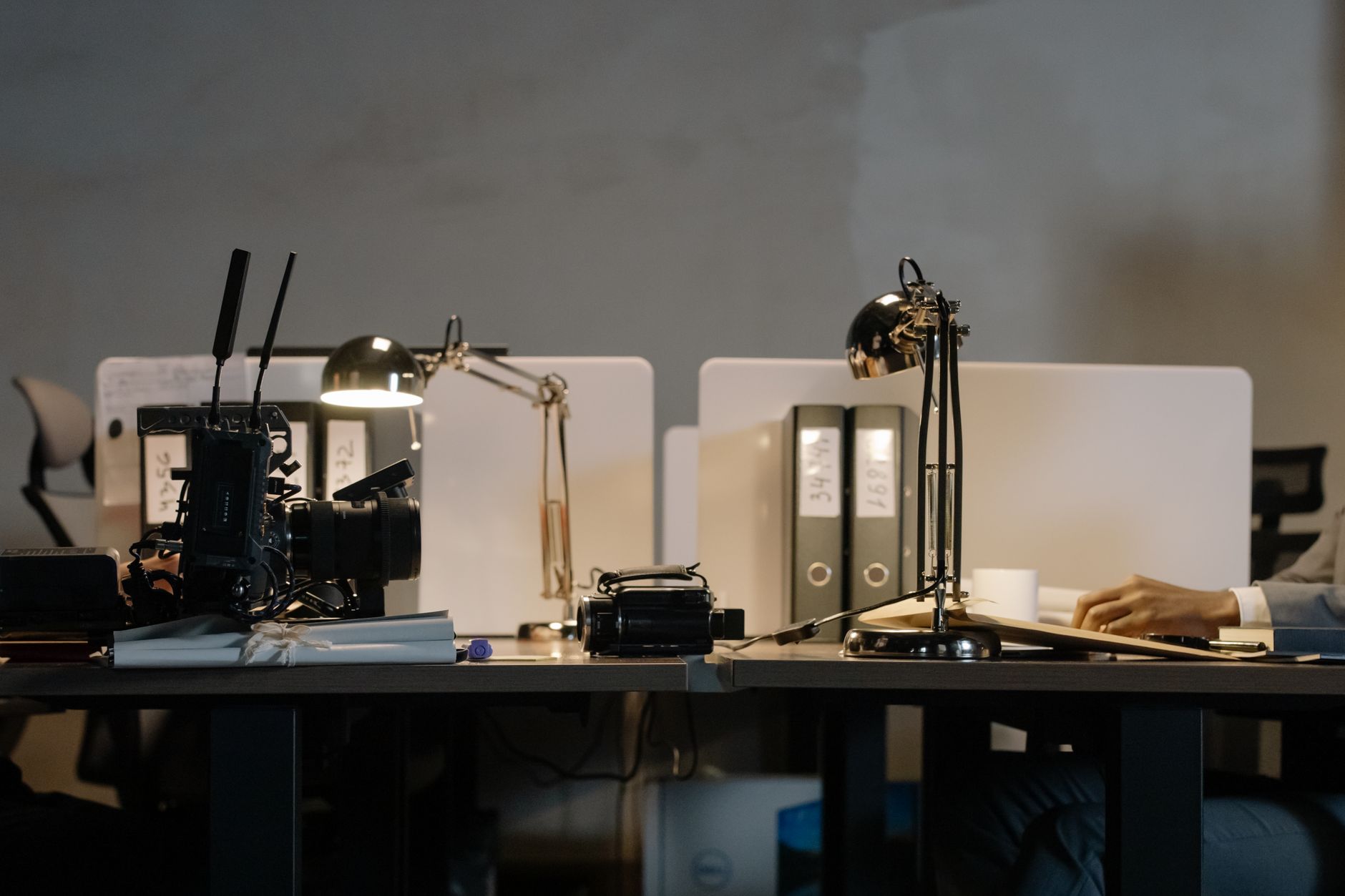 A desk lamp lighting a home workspace