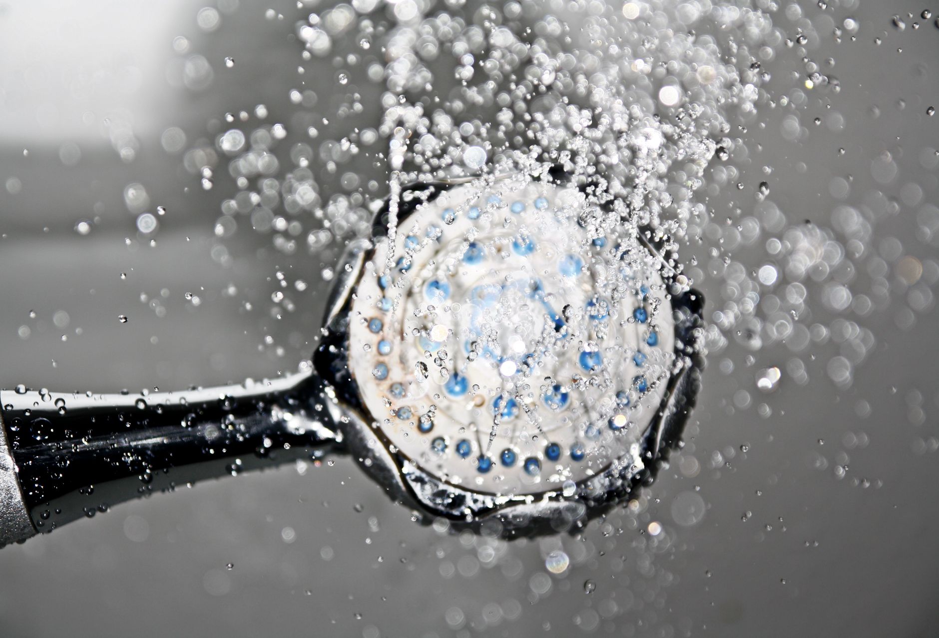 Water spraying from a shower head