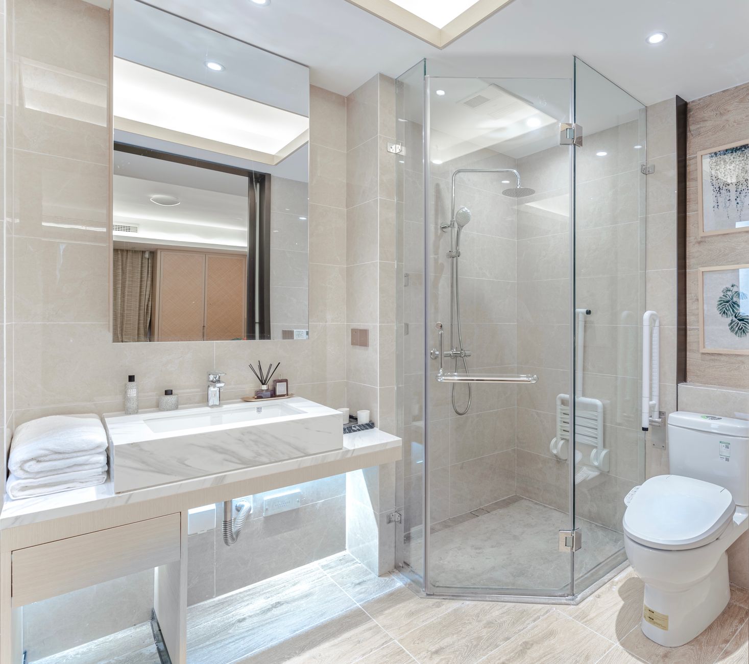 A grab bar mounted on a bathroom wall