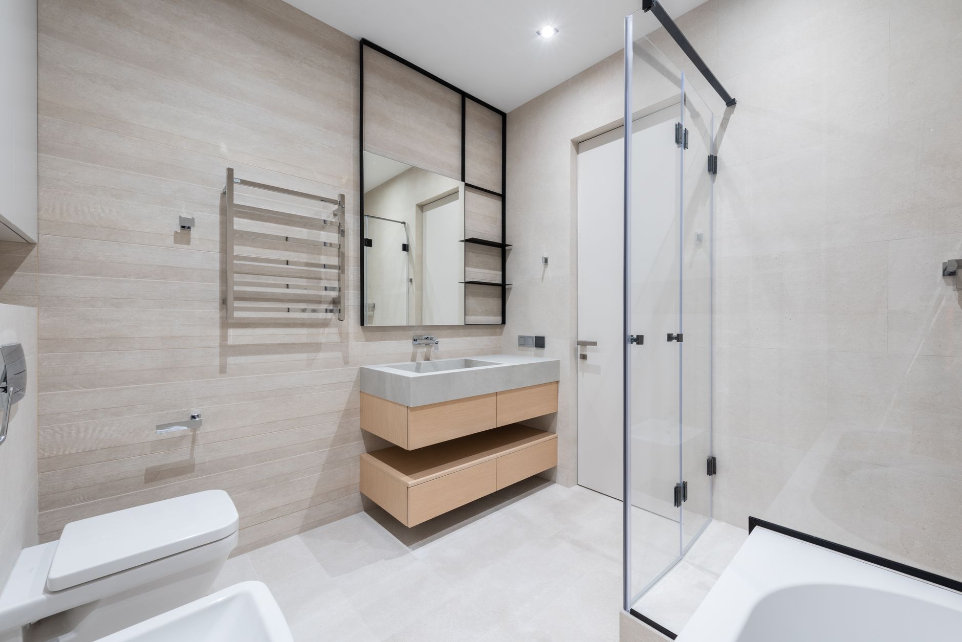 Best shower squeegee: a clean glass shower door in a bathroom